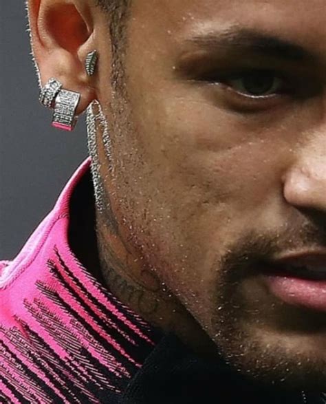 neymar ear piercings.